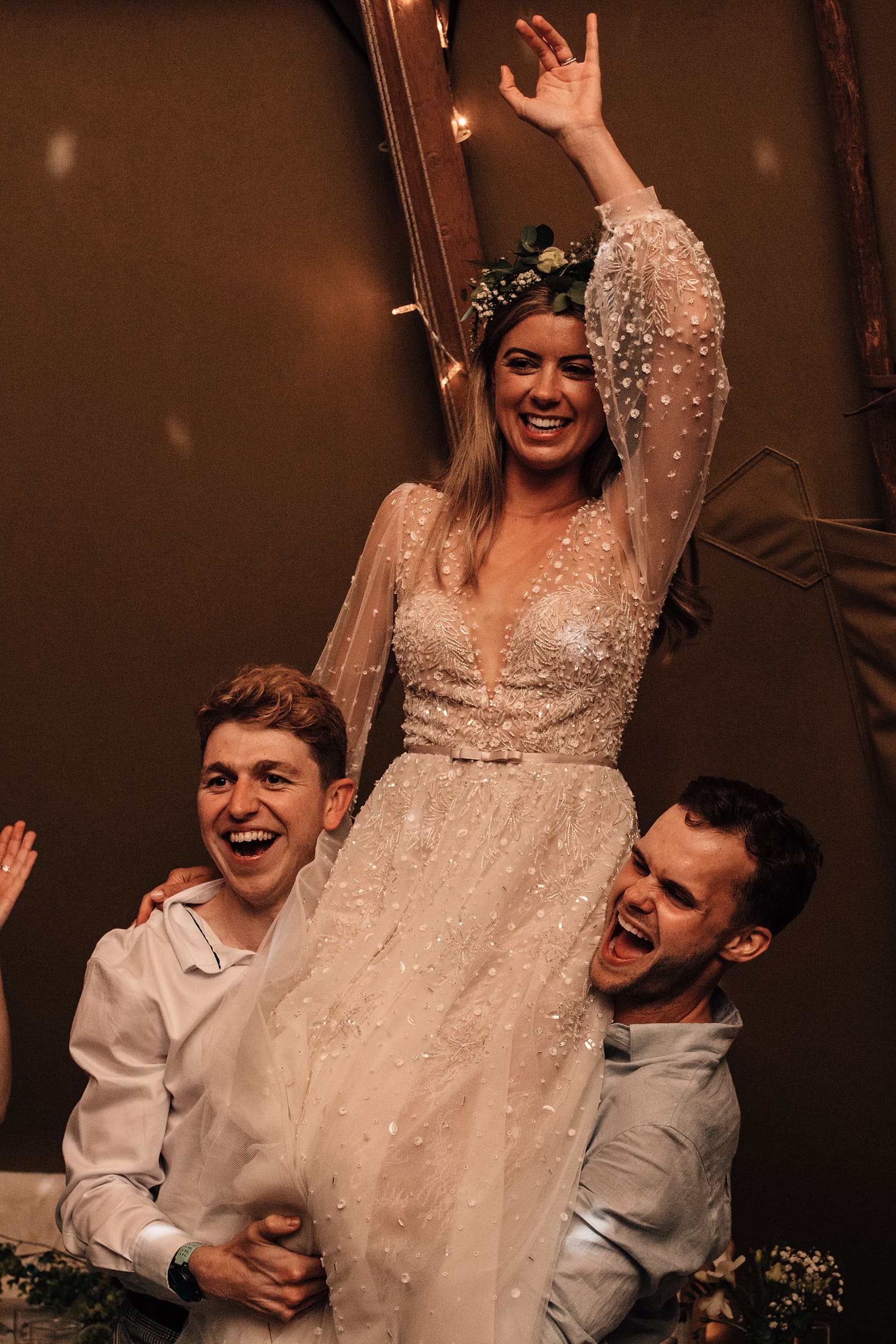 wild wedding dance floor bride on shoulders