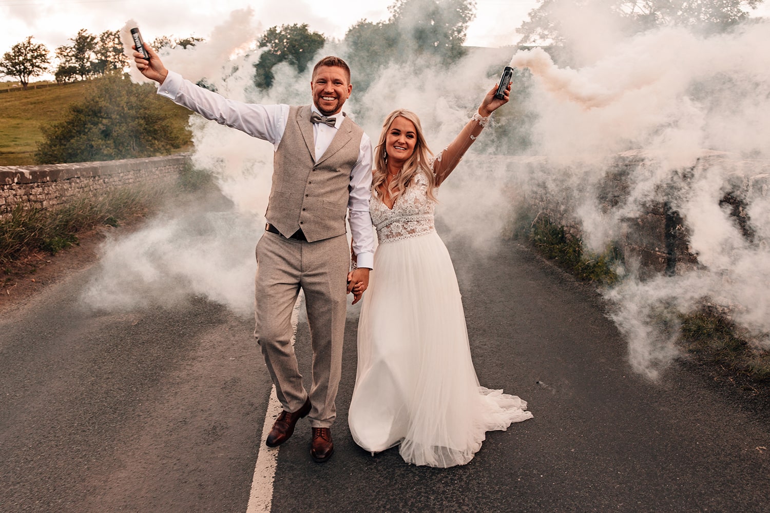 Bride and Groom with smoke bombs in the Yorkshire Dales