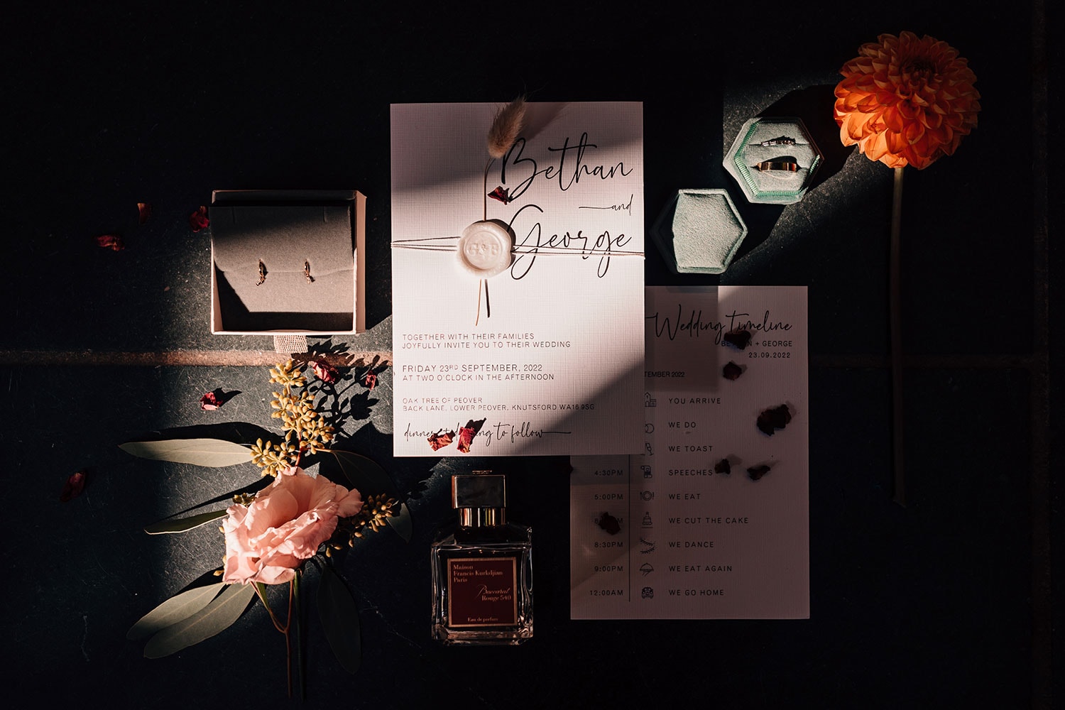 wedding details layflat photograph, soft greens, pinks and bold oranges