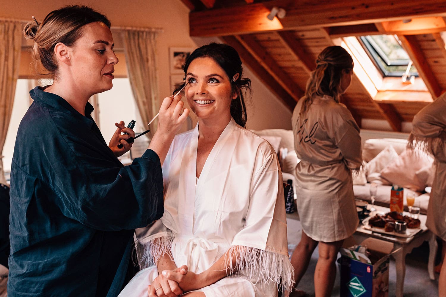 Our approach to photographing your bridal preparations, the bride getting her makeup done